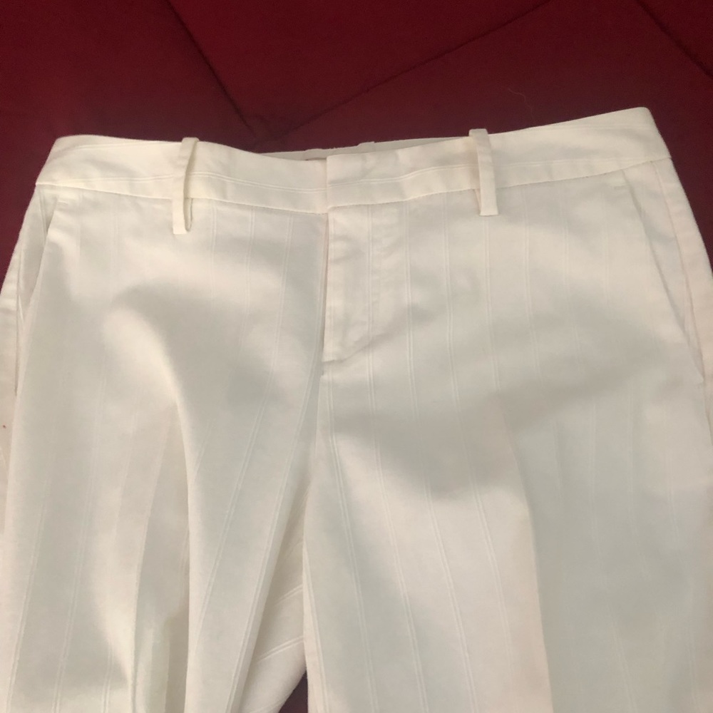 White pants with tiny tucks